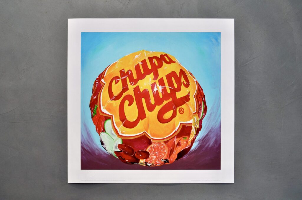 Hand-painted Chupa Chups lollipop artwork on a grey wall